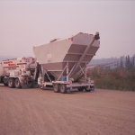 Yukon River - Volumetric Mixer with cement silo at Yukon River Bridge coming back from batching 600+ yrds on  DOT maintenance station at Atigun Pass.