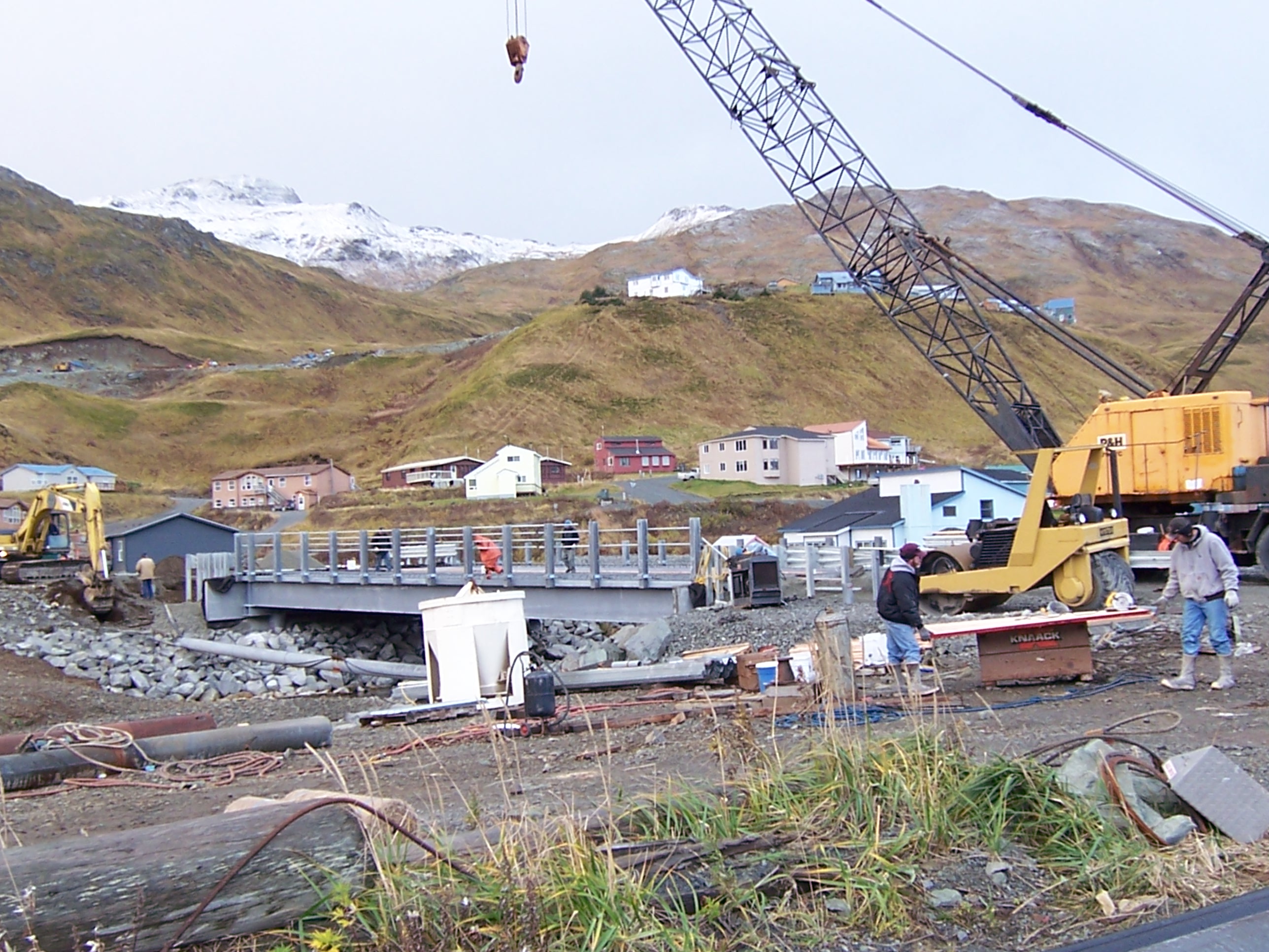 Unalaska-High strength silica fume overlay on bridge demanded close supervision on batching.
